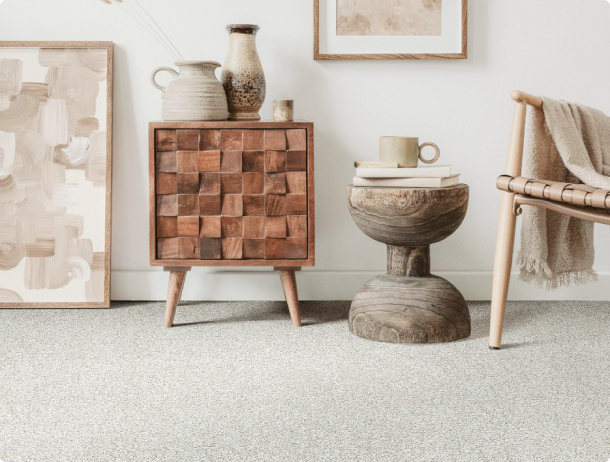4 pieces of decorative furnitures on carpet flooring