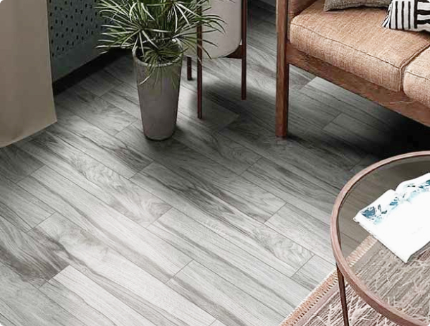 Grey wood flooring with furnitures